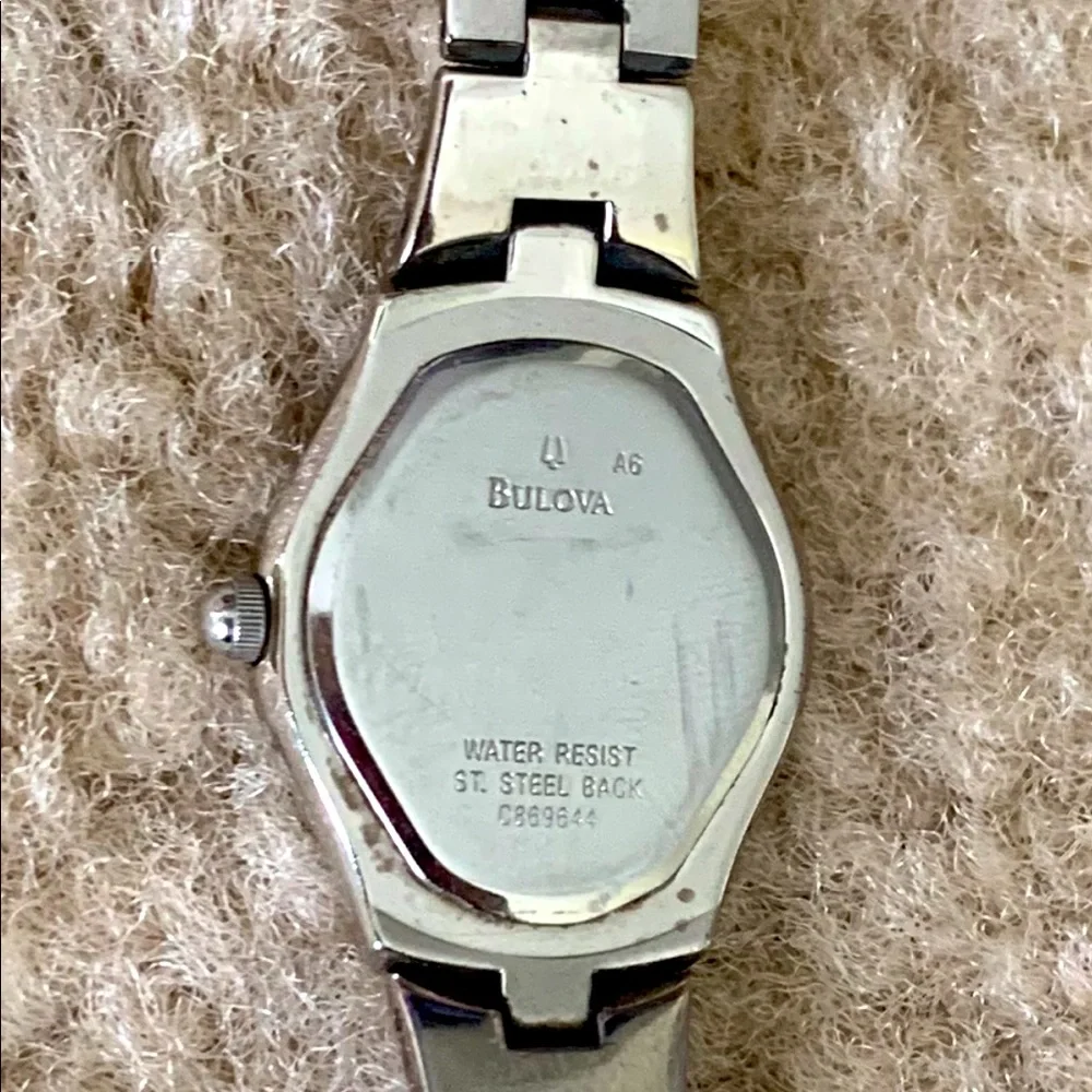 Bulova Silver Ladies Caravelle Black Dial Crystal Bezel Water Resistant Watch
